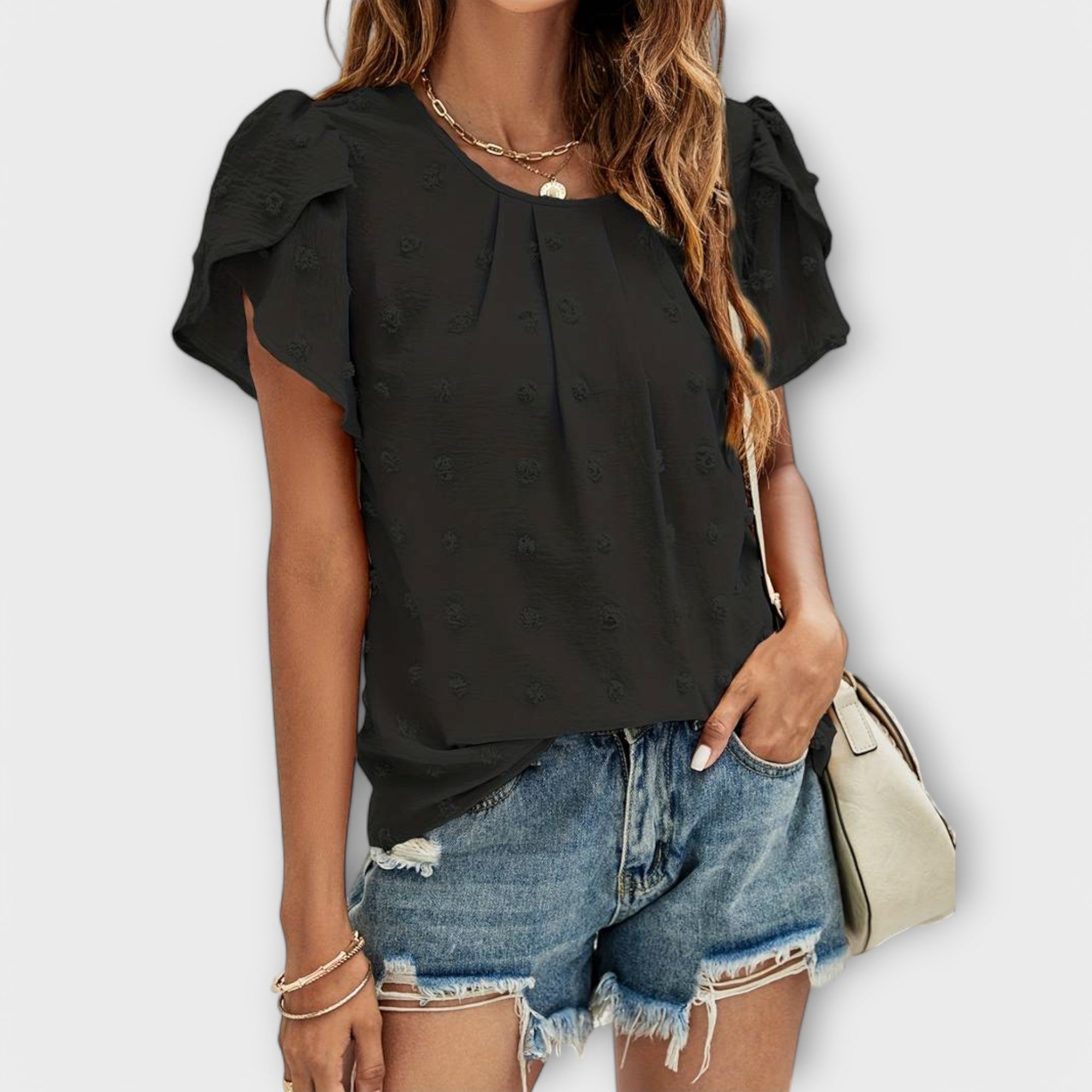Charlotte – La Blusa Perfecta de Puntos