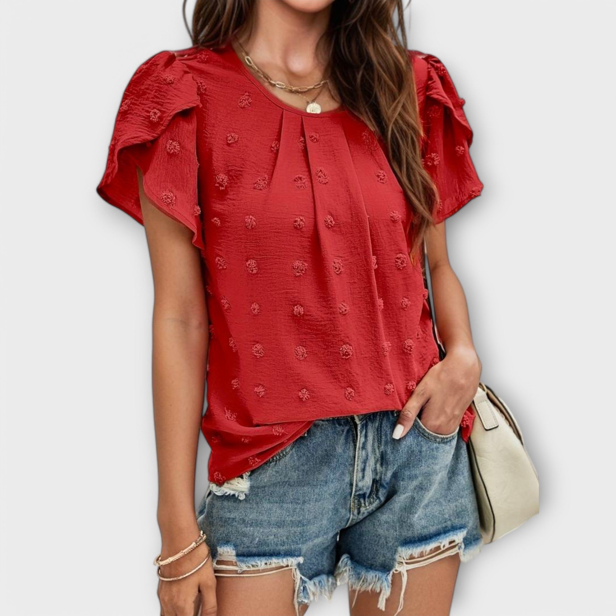 Charlotte – La Blusa Perfecta de Puntos