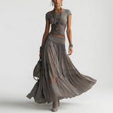 Griseline — Elegante vestido gris etéreo con material fluido