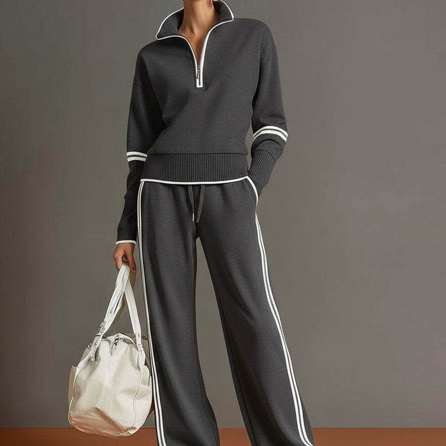 Carla - Conjunto Deportivo Retro con Cinturón en Color Gris y Blanco con Media Cierre y Pantalones Anchos