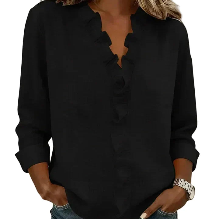 CLARA - Blusa con escote en V y delicados volantes