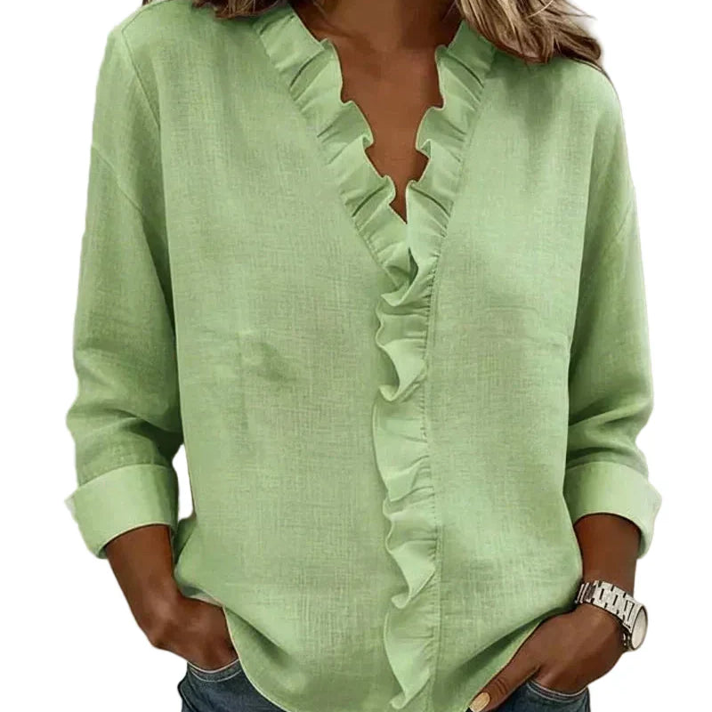 CLARA - Blusa con escote en V y delicados volantes