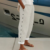 Cybèle | Pantalones elegantes con botones y rayas