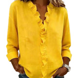 CLARA - Blusa con escote en V y delicados volantes
