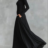 Adele - Moderna duga haljina od crnog krepa sa brošem i nabranim detaljima