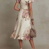 Elegantes retro-inspiriertes Midikleid aus Satin mit floralem Muster