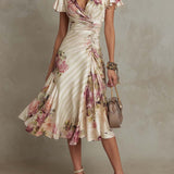 Elegantes retro-inspiriertes Midikleid aus Satin mit floralem Muster