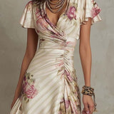 Elegantes retro-inspiriertes Midikleid aus Satin mit floralem Muster